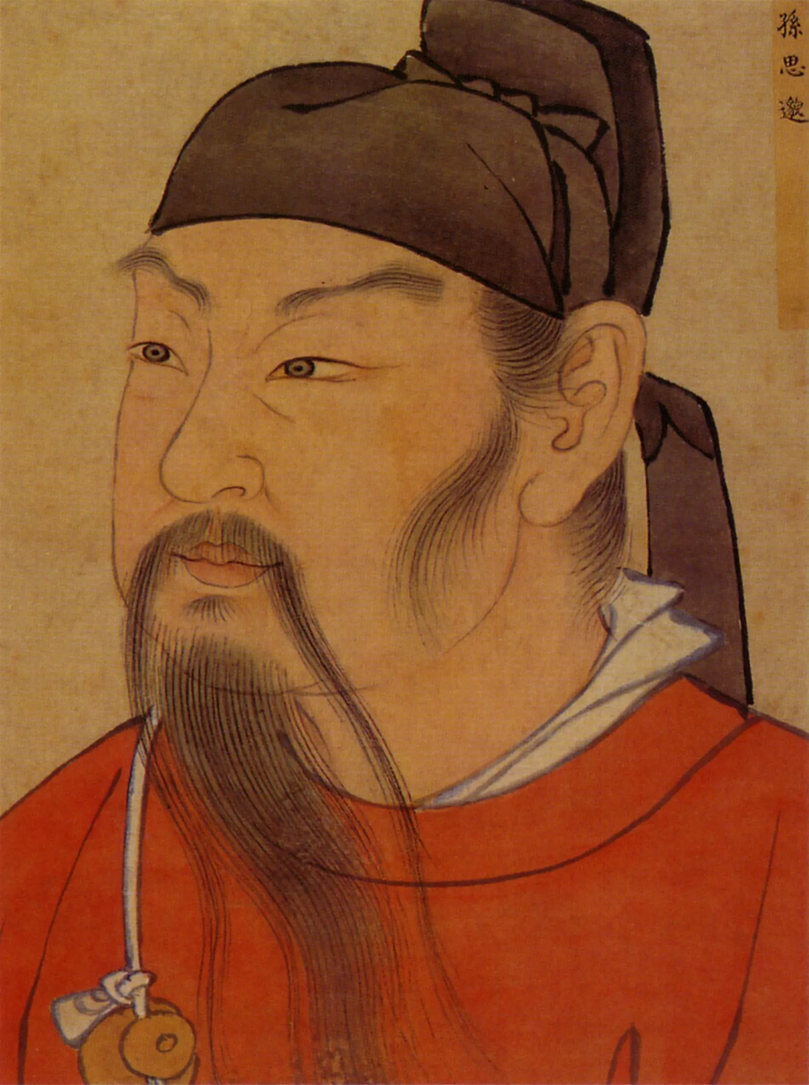 Traditional Chinese portrait of a Taoist herbalist in a red robe and black cap