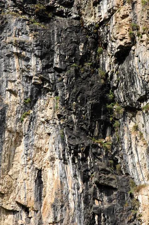 A steep Himalayan rock face where shilajit is found